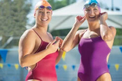 Dolfin Uglies - Revibe Purple Solid Tie Back One Piece Swimsuit 21 Dolfin Uglies - Revibe Purple Solid Tie Back One Piece Swimsuit -Swim and Beyond dolfin uglies revibe purple solid tie back one piece swimsuit 11